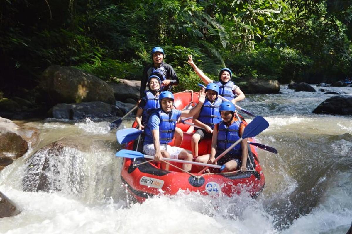a group of people on a raft in a river