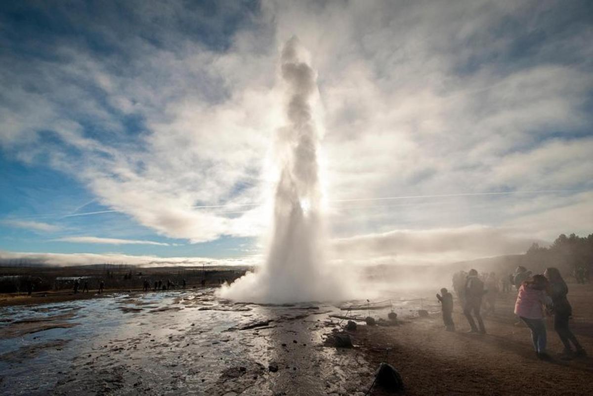 a geosphere of steam erupting from a body of water