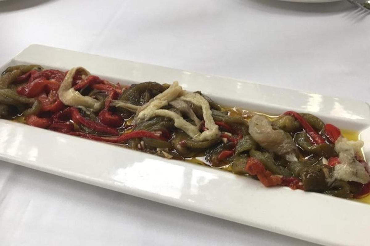a plate of food on a white table
