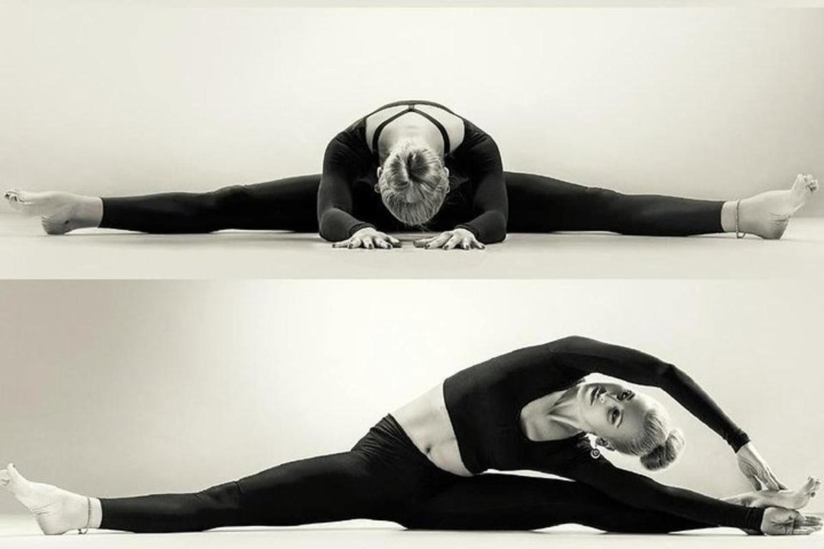 a woman is laying on the floor in a dance pose