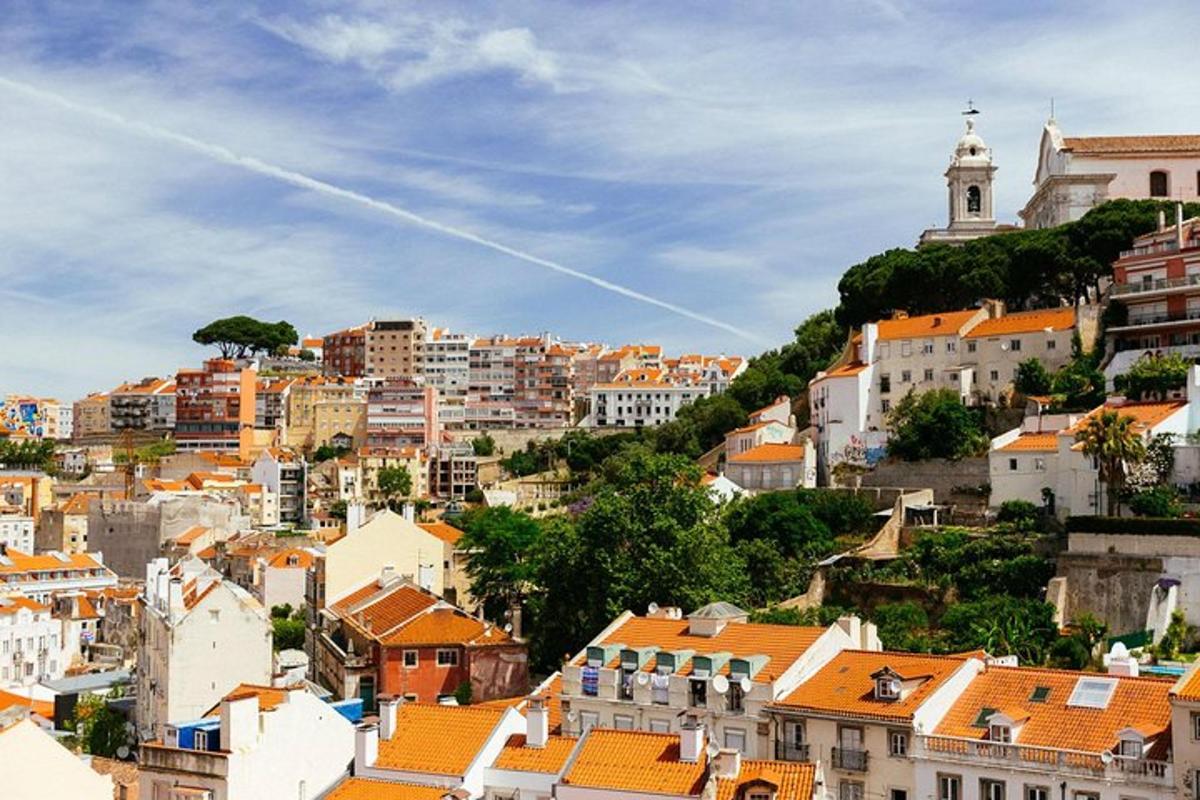a view of a city with buildings on a hill