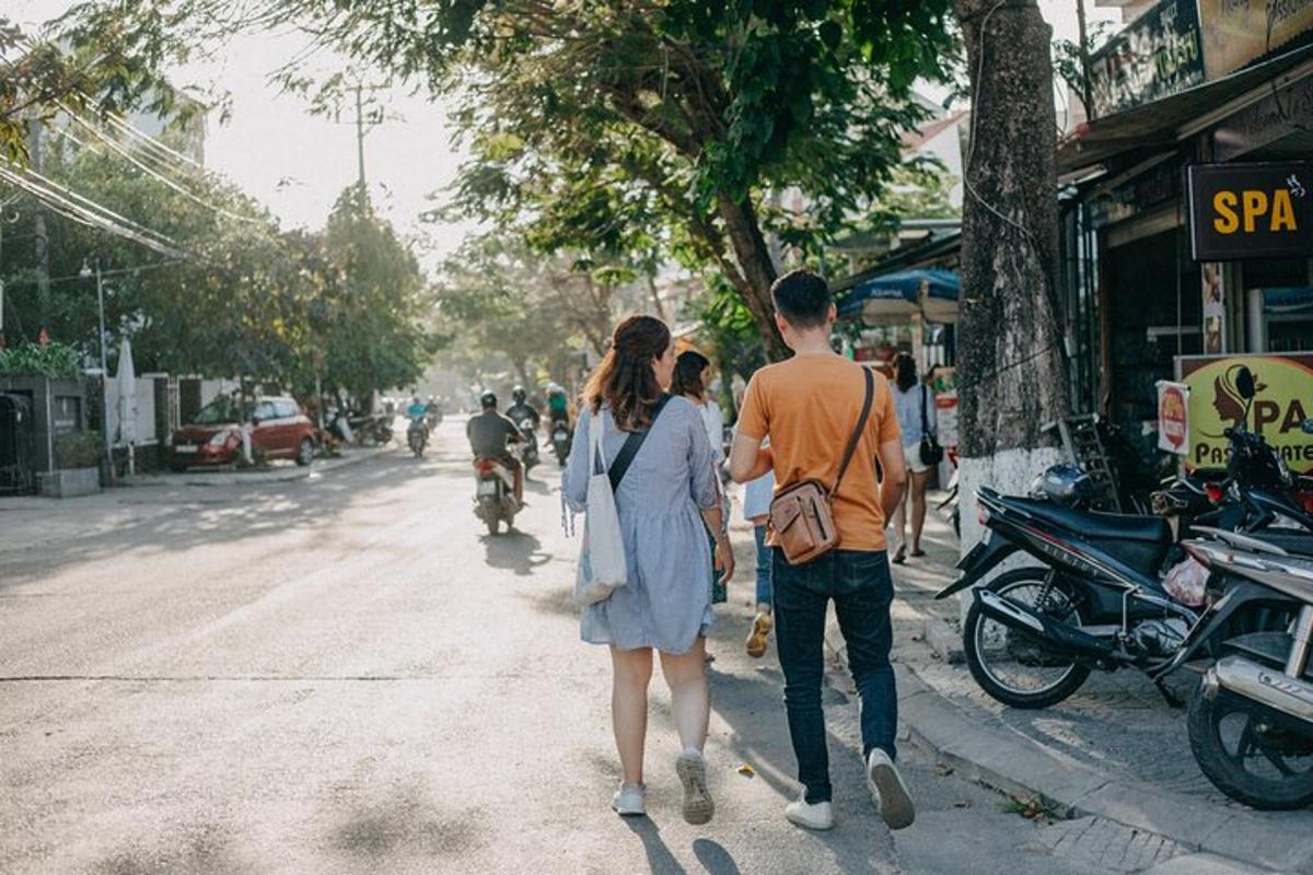 a man and a woman walking down a street