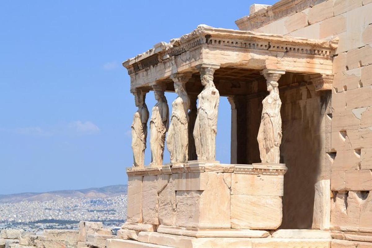a stone building with columns on the side
