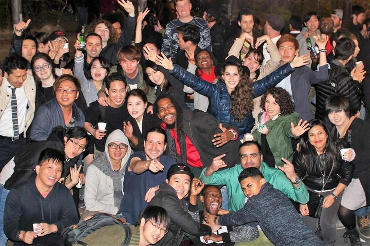 a large group of people posing for a picture