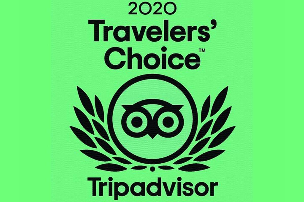 a sign that reads travelers choice triadvisor