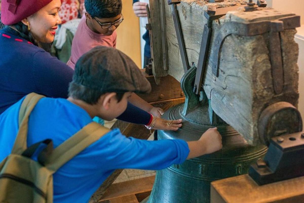 a group of people working on a grinding machine
