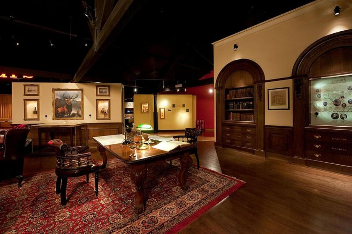 a room with a table and chairs in a room