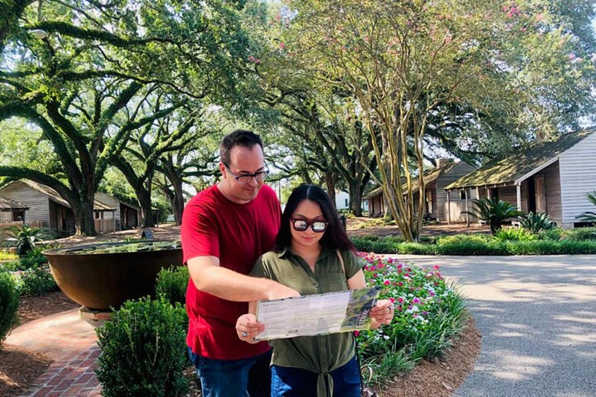 a man and a woman are holding a map