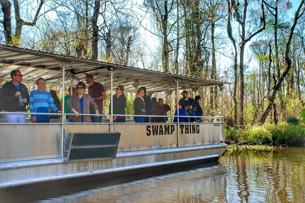 a group of people on a boat on the water