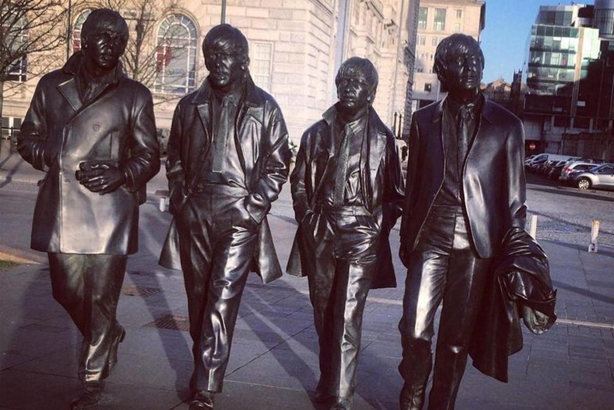 a statue of a group of four musicians