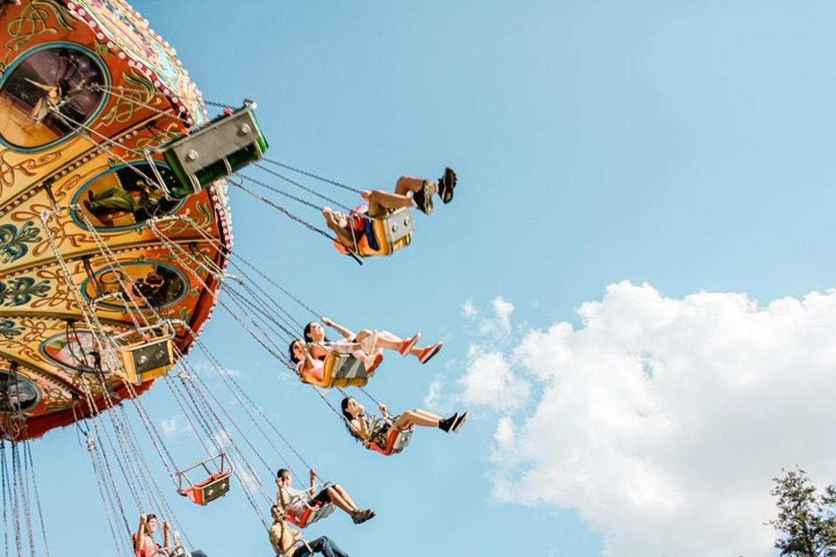 a group of people riding on a ferris wheel