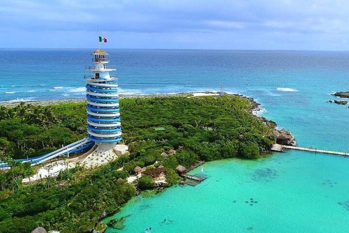a lighthouse on a island next to a body of water