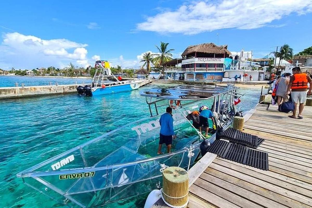 a boat is docked at a dock in the water