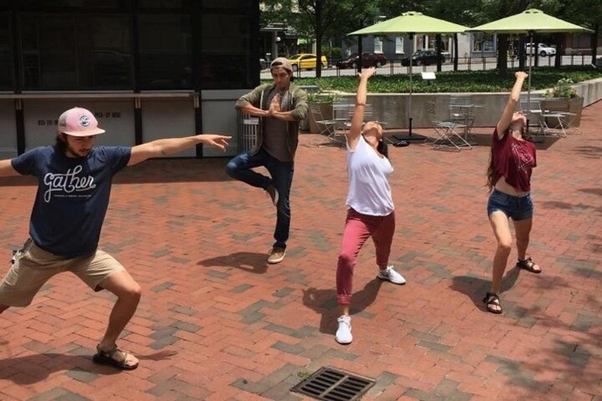 a group of people playing with a frisbee