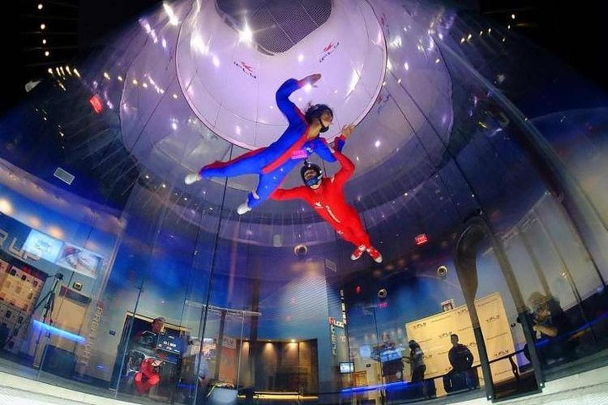 two people are in a balloon in a building