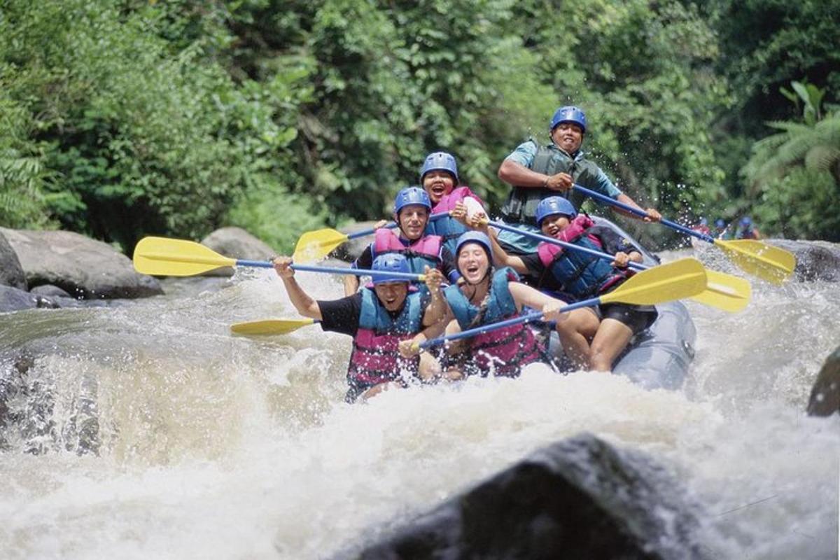 a group of people are rafting on a river