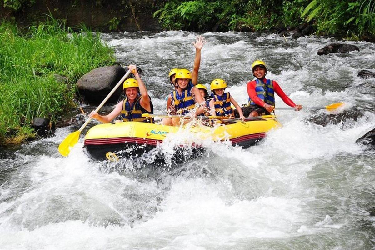 a group of people in a raft in a river