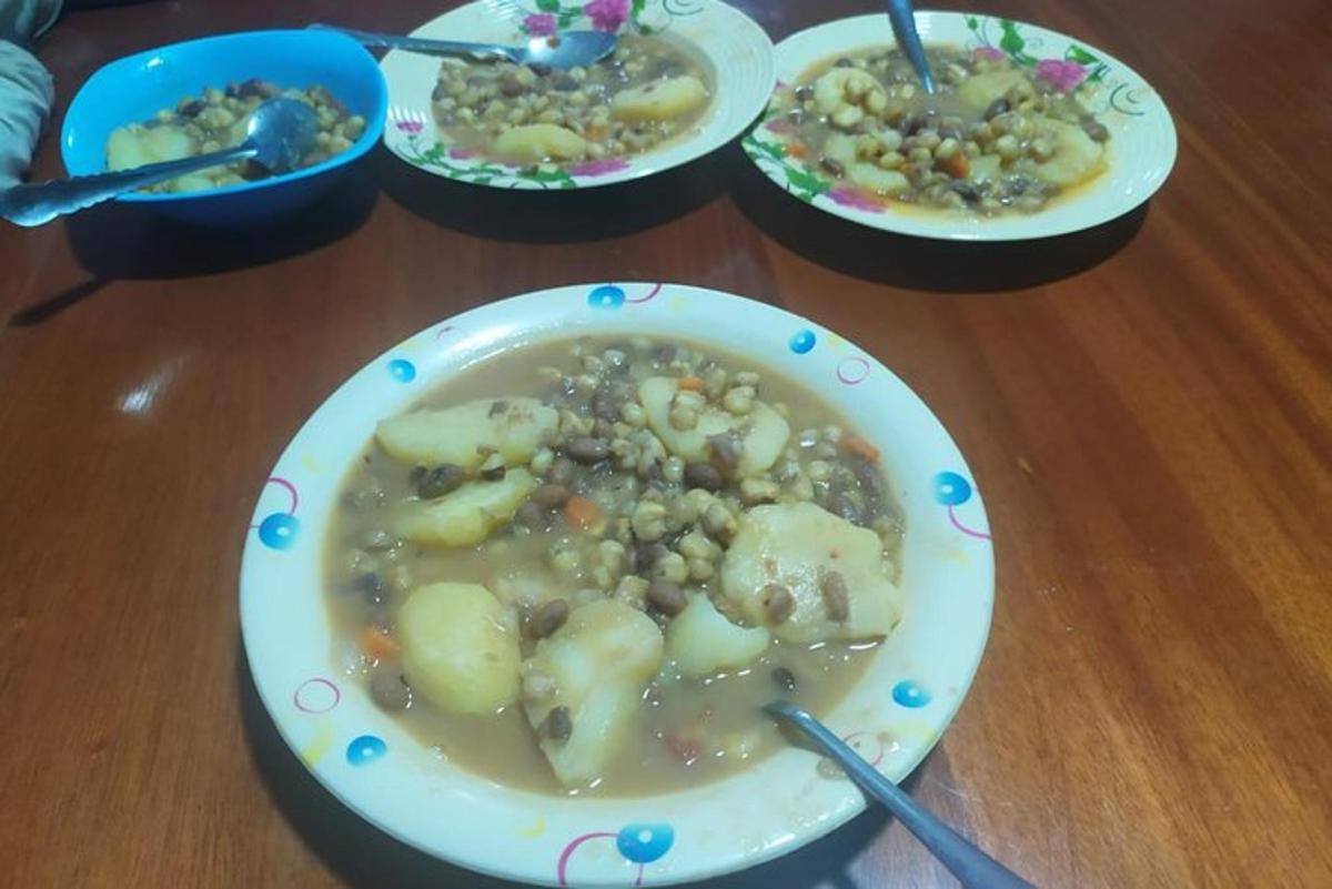 a table with four plates of food on a table