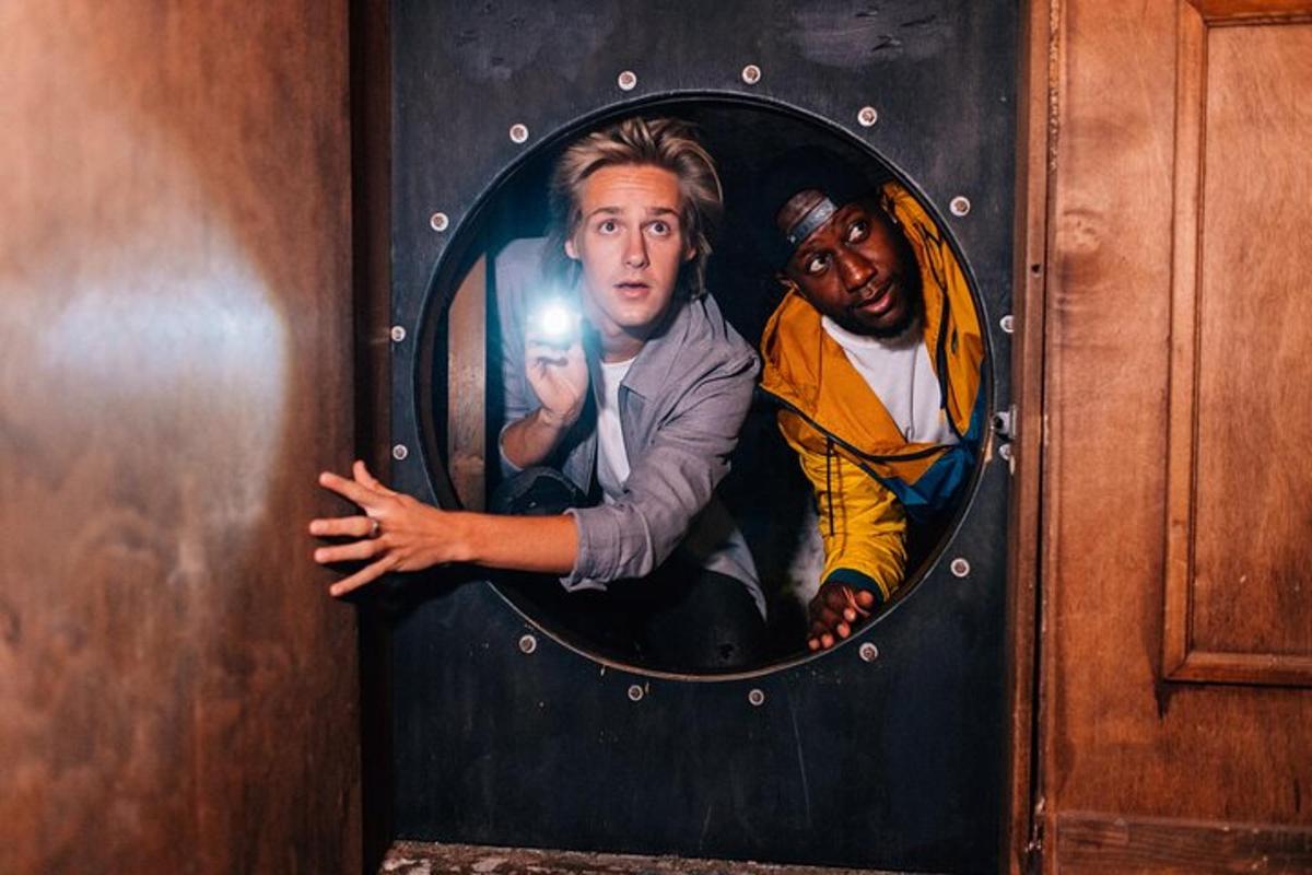 a mirror with a picture of two men on it