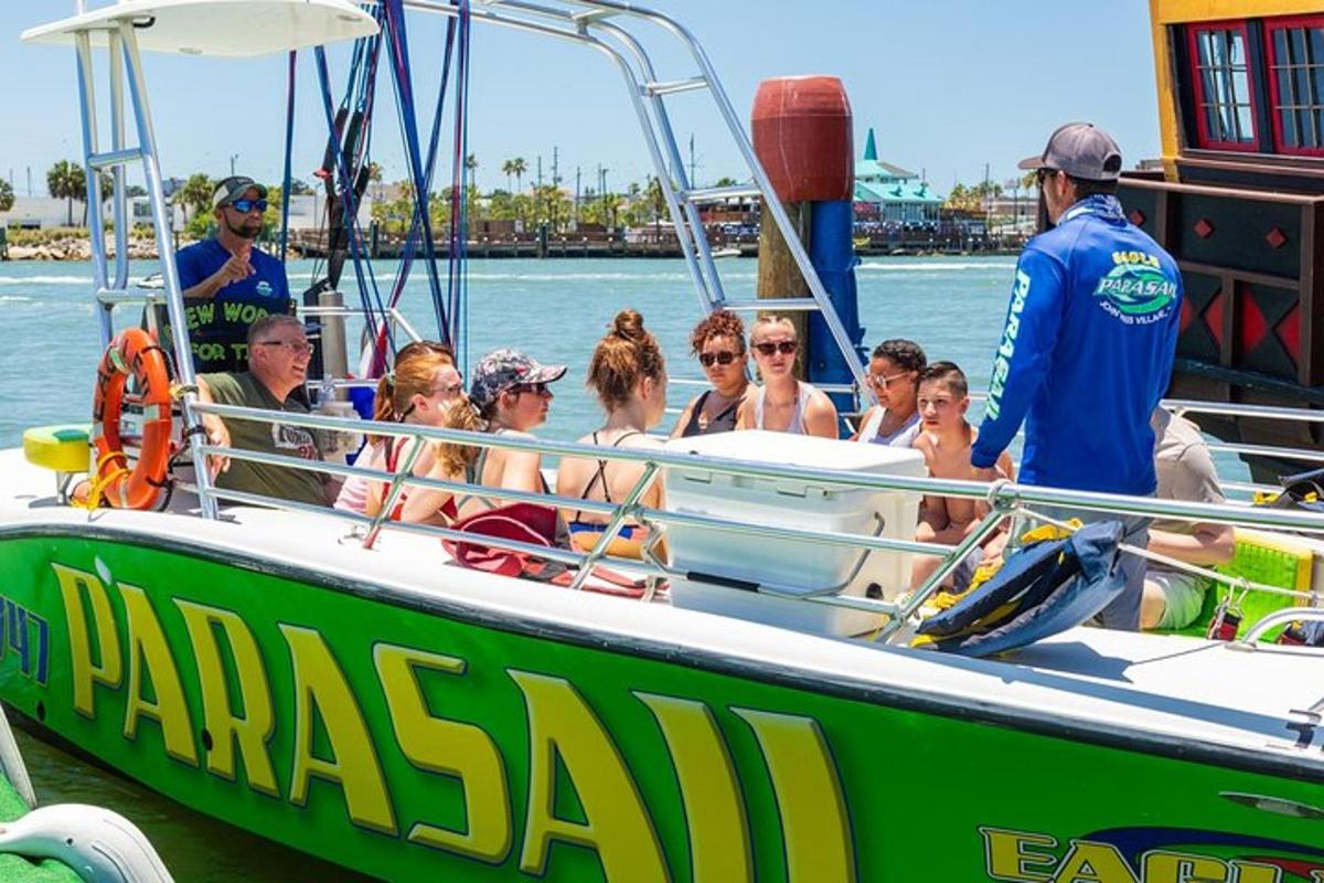 a group of people on a boat in the water