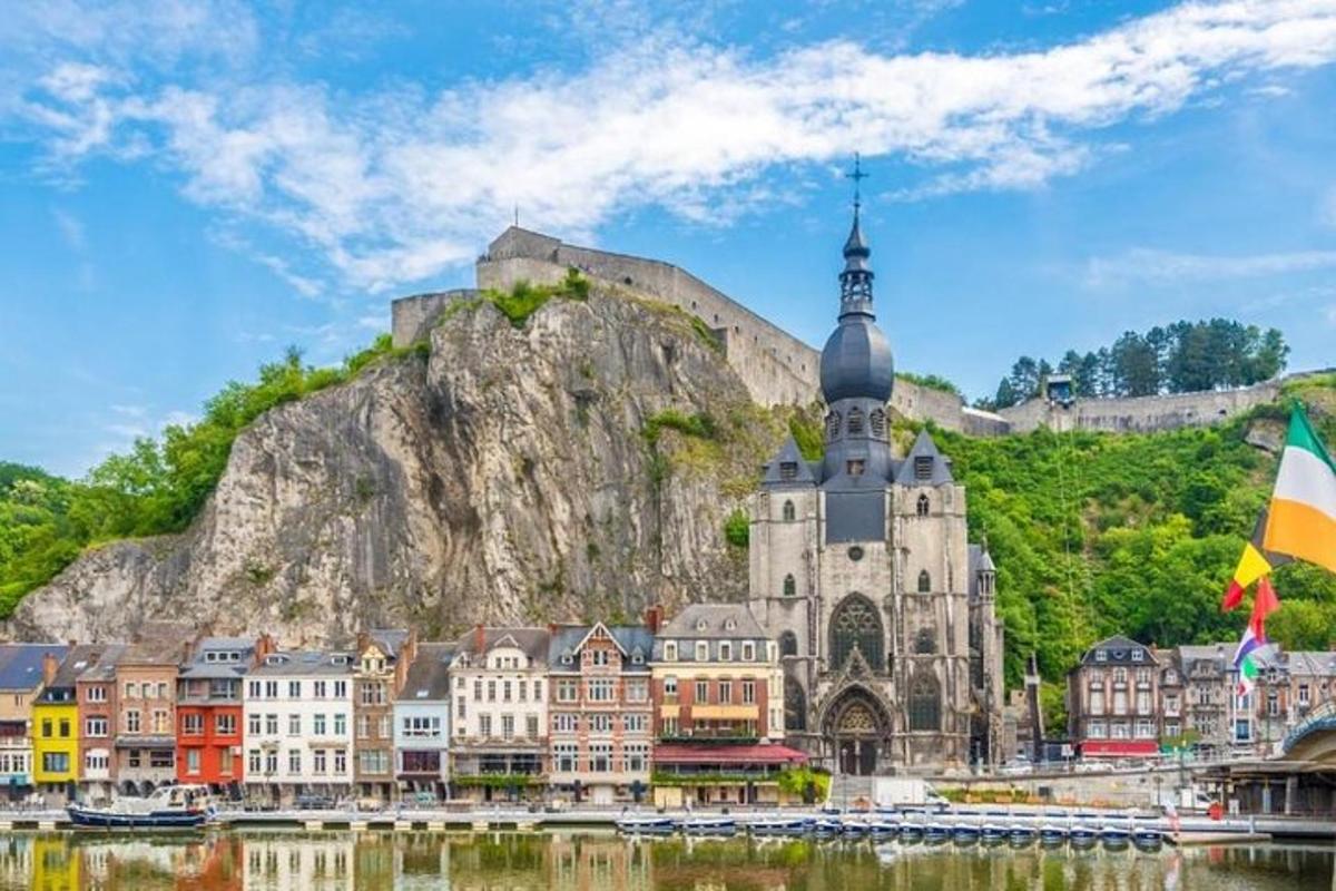 a view of the town of berbourg with a mountain