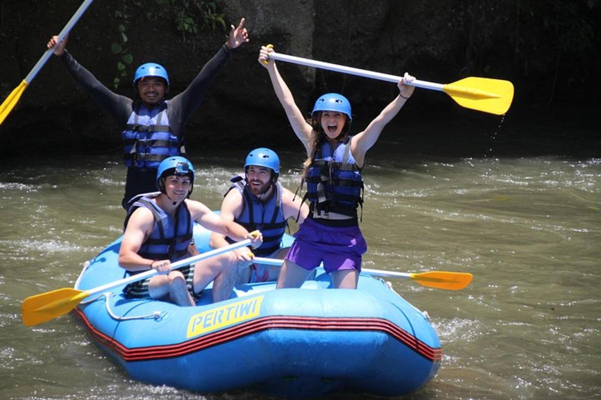 a group of people on a raft in the river