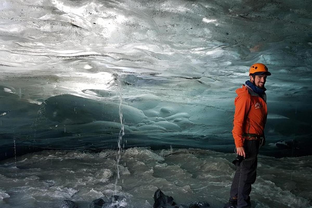 a man is standing in front of a polar bear