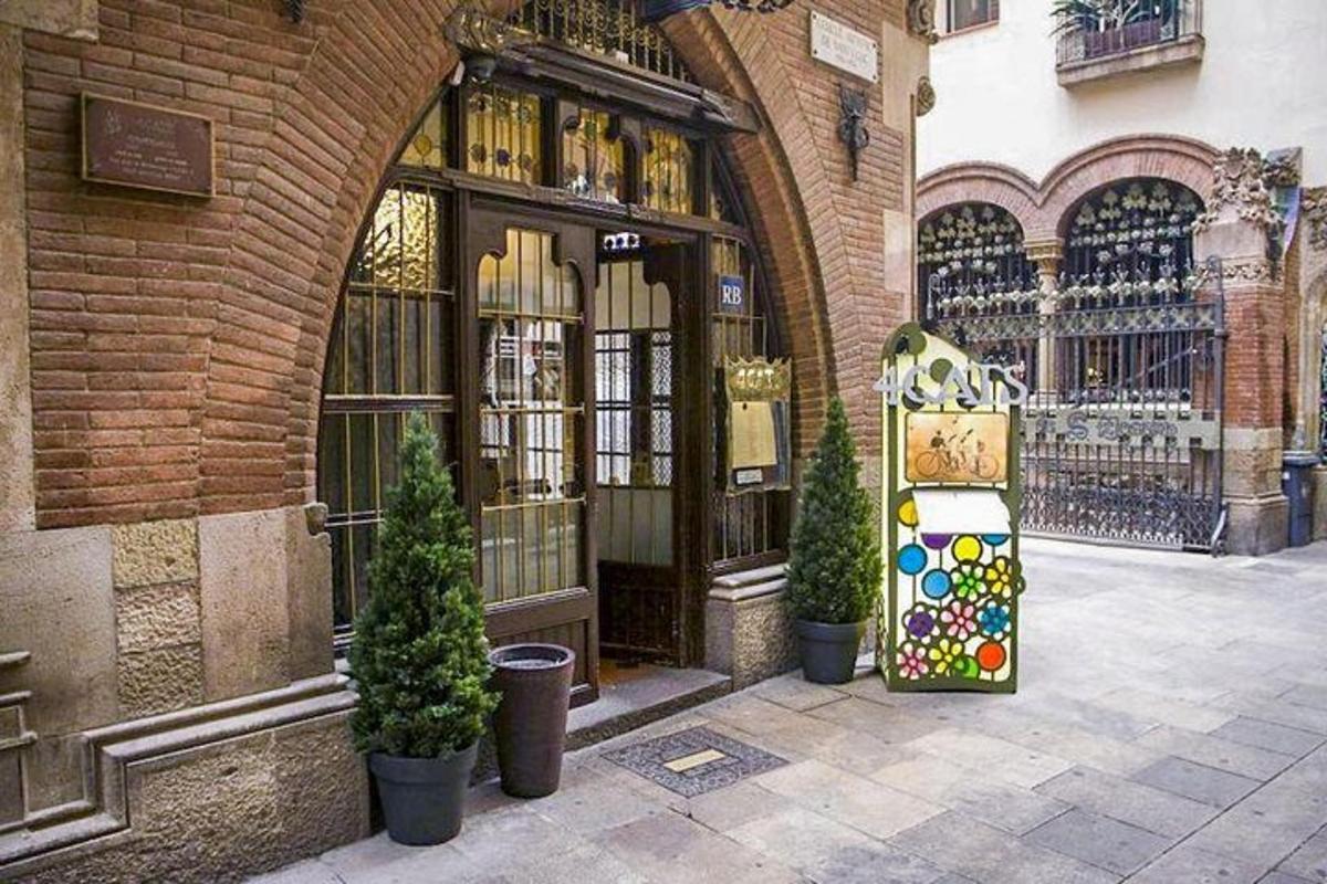 a brick building with an entrance to a store