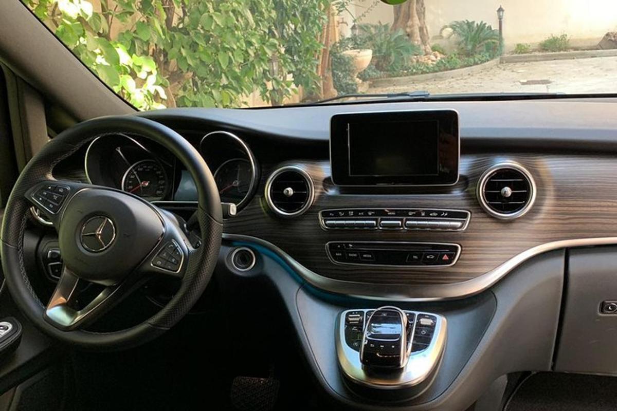 a view of the dashboard of acedes benz car