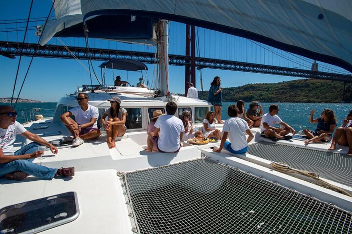 a group of people sitting on the deck of a boat