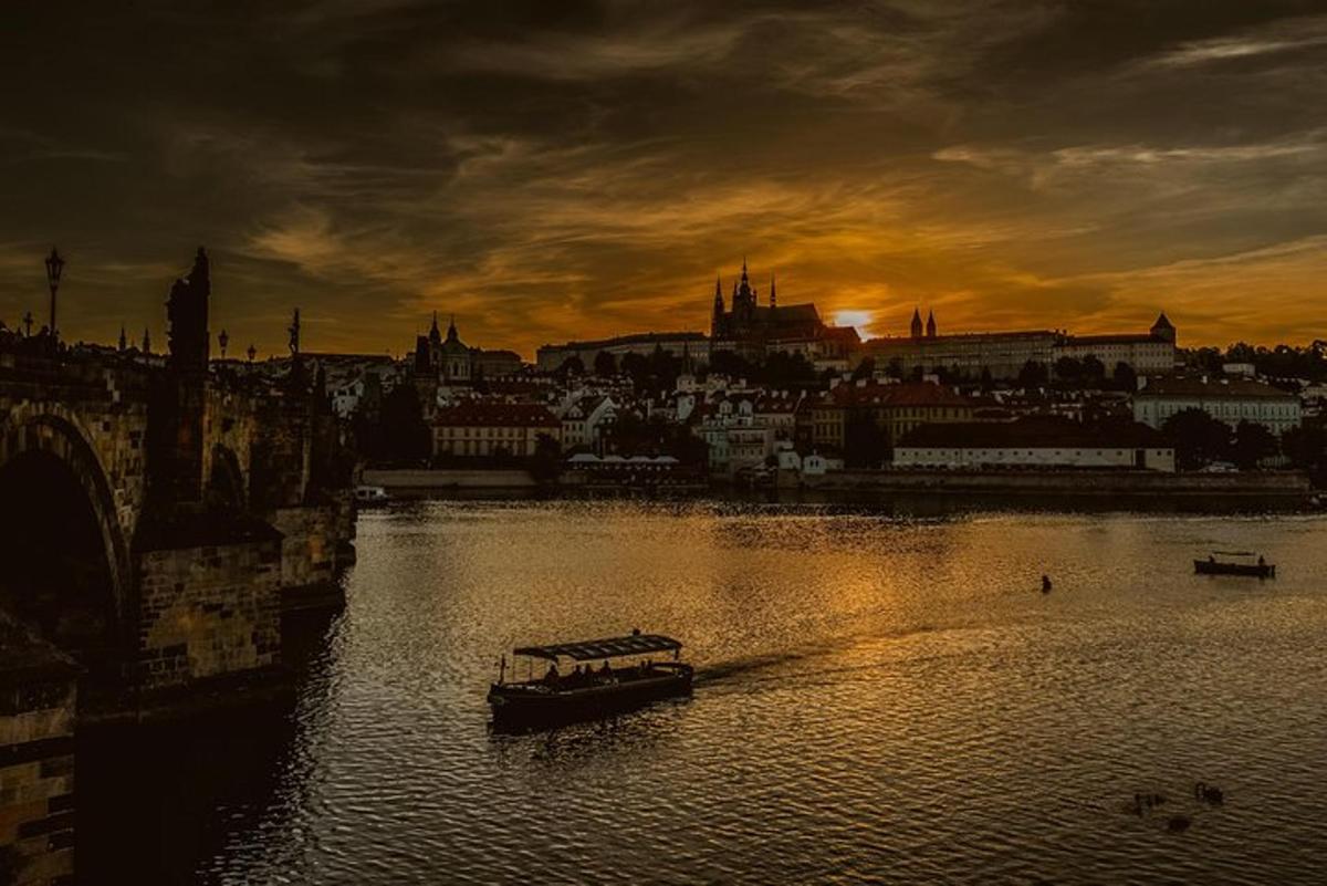 a boat on a river with a city in the background