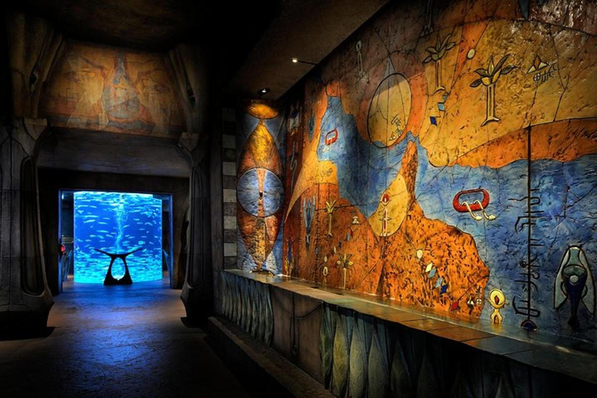 a hallway with a wall with a map of the world