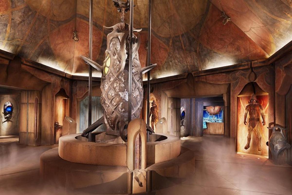 a room with a statue in the center of a building