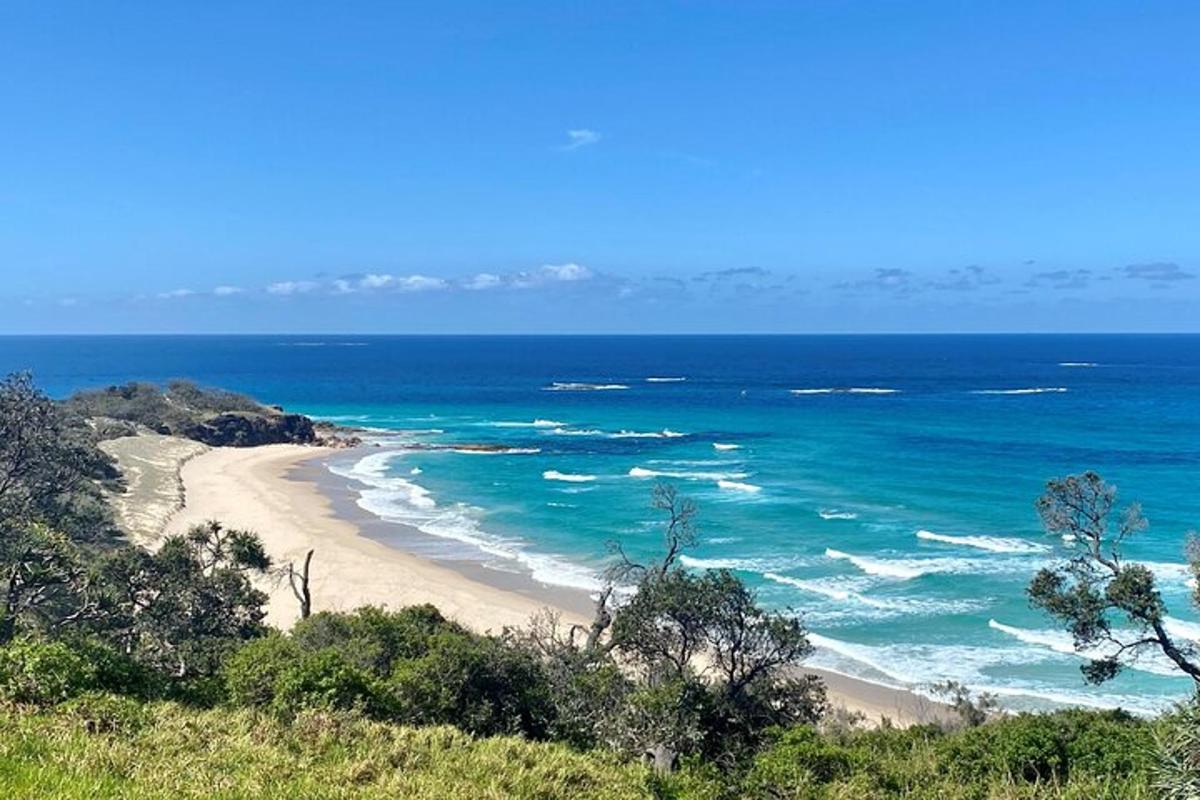 a view of a beach with the ocean