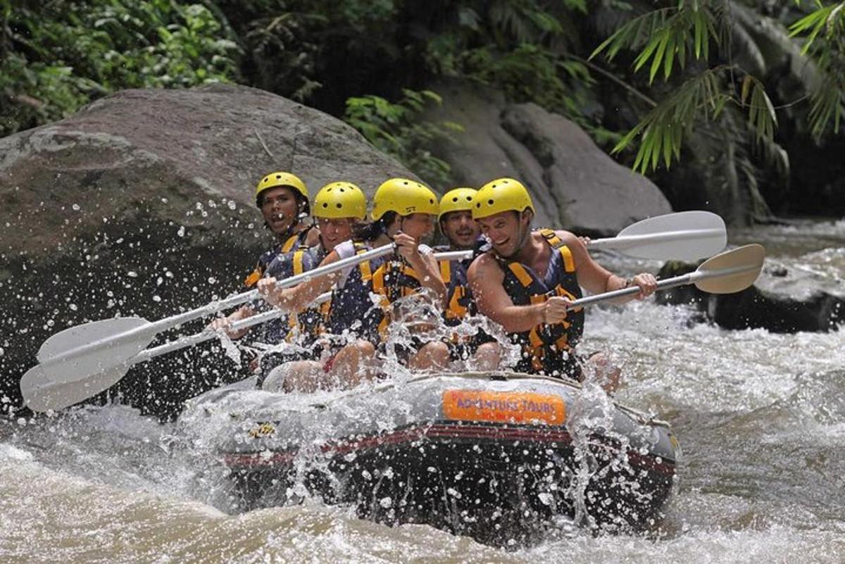 a group of people in a raft in the water