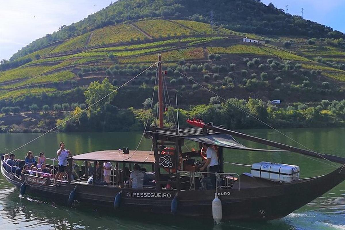 a group of people on a boat in the water