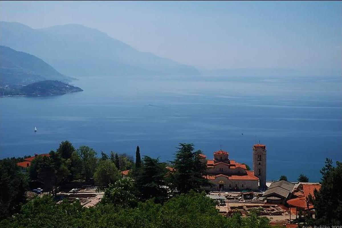 a view of a town and a body of water
