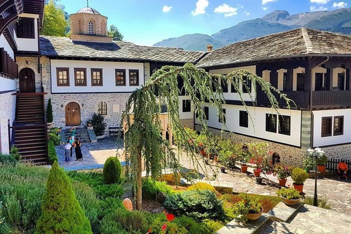 a large house with a garden in front of it