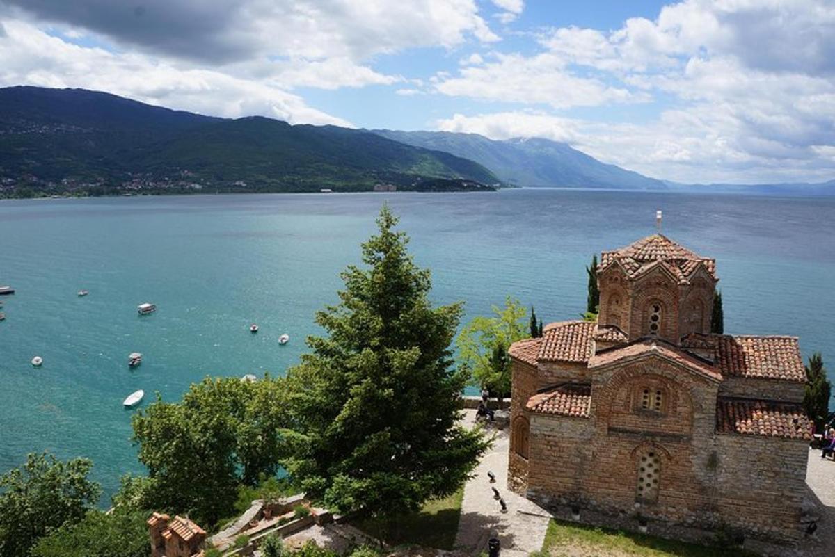 a building on the shore of a large body of water