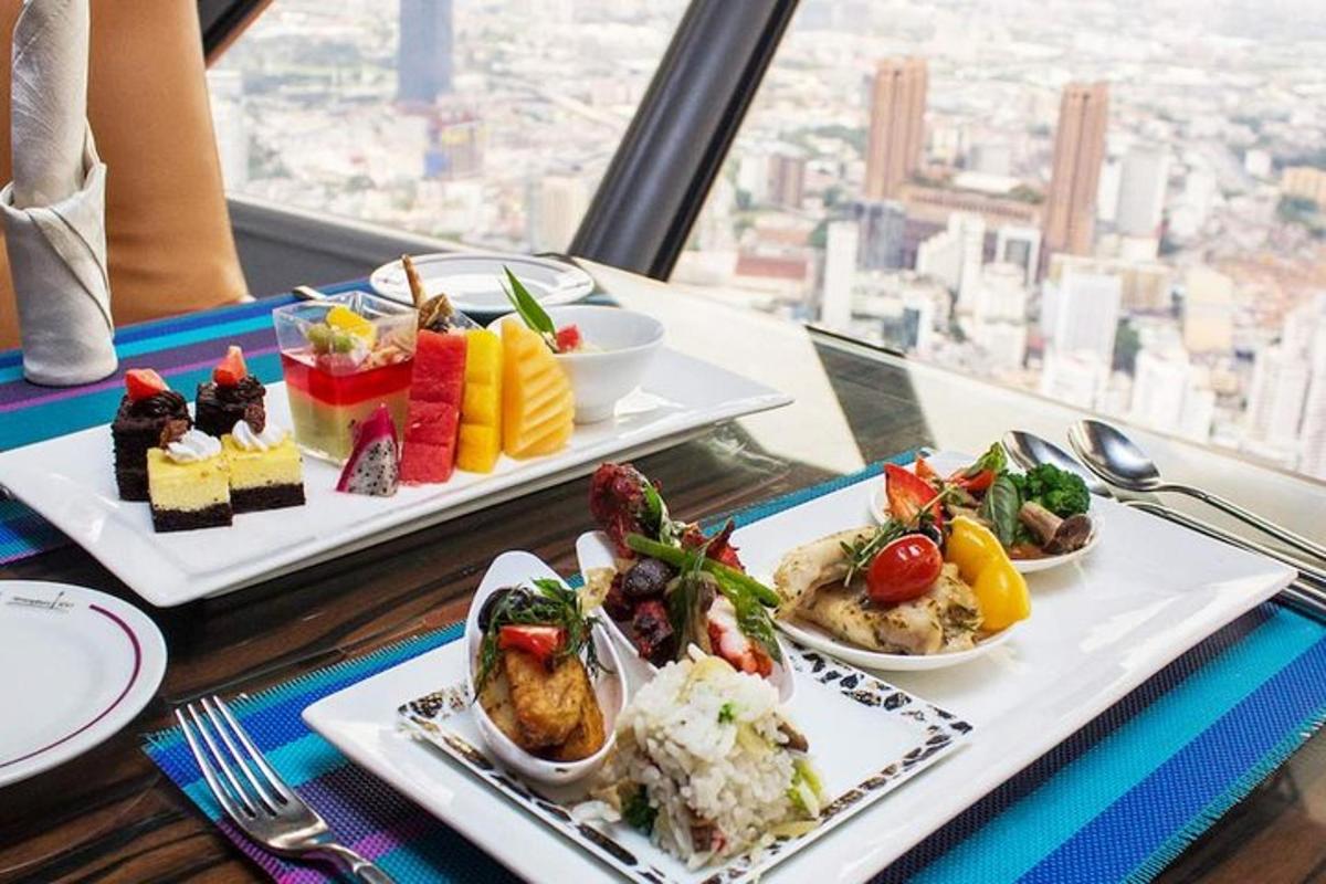 a table with two trays of food on plates