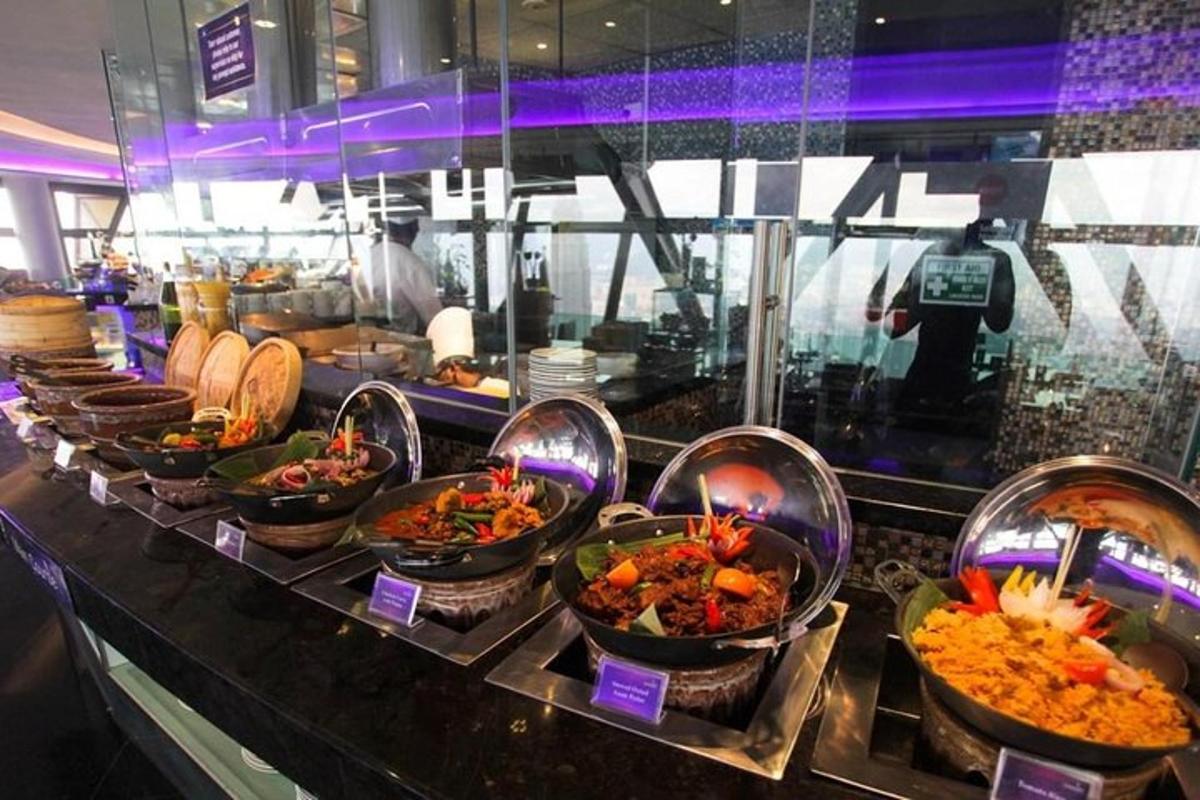 a buffet line with many different types of food
