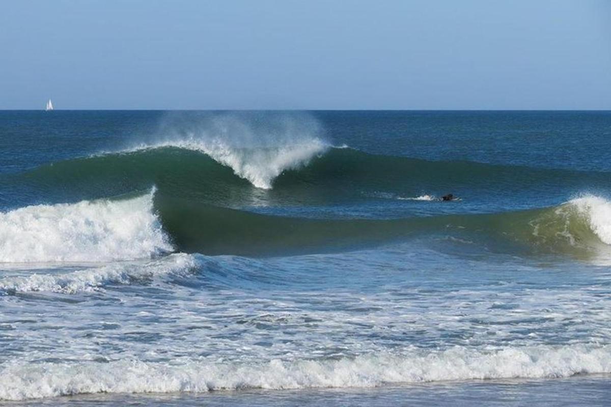 a person riding a wave in the ocean