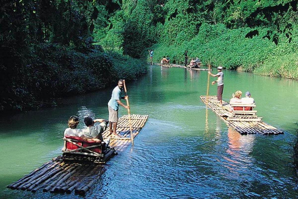 a group of people on rafts in a river