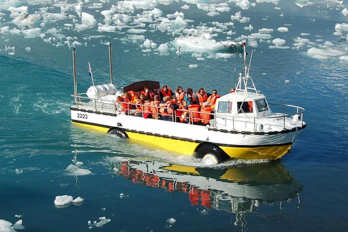 a group of people on a boat in the water