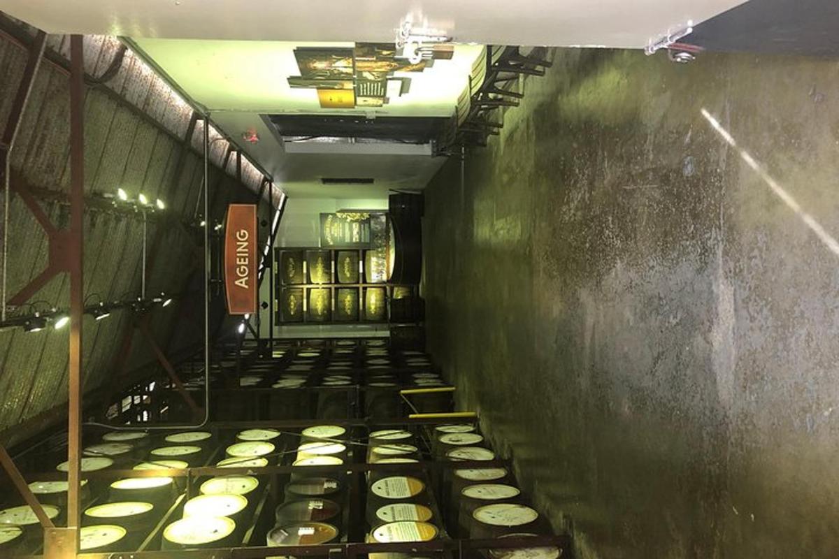 a hallway of a subway train with a bunch of sushi