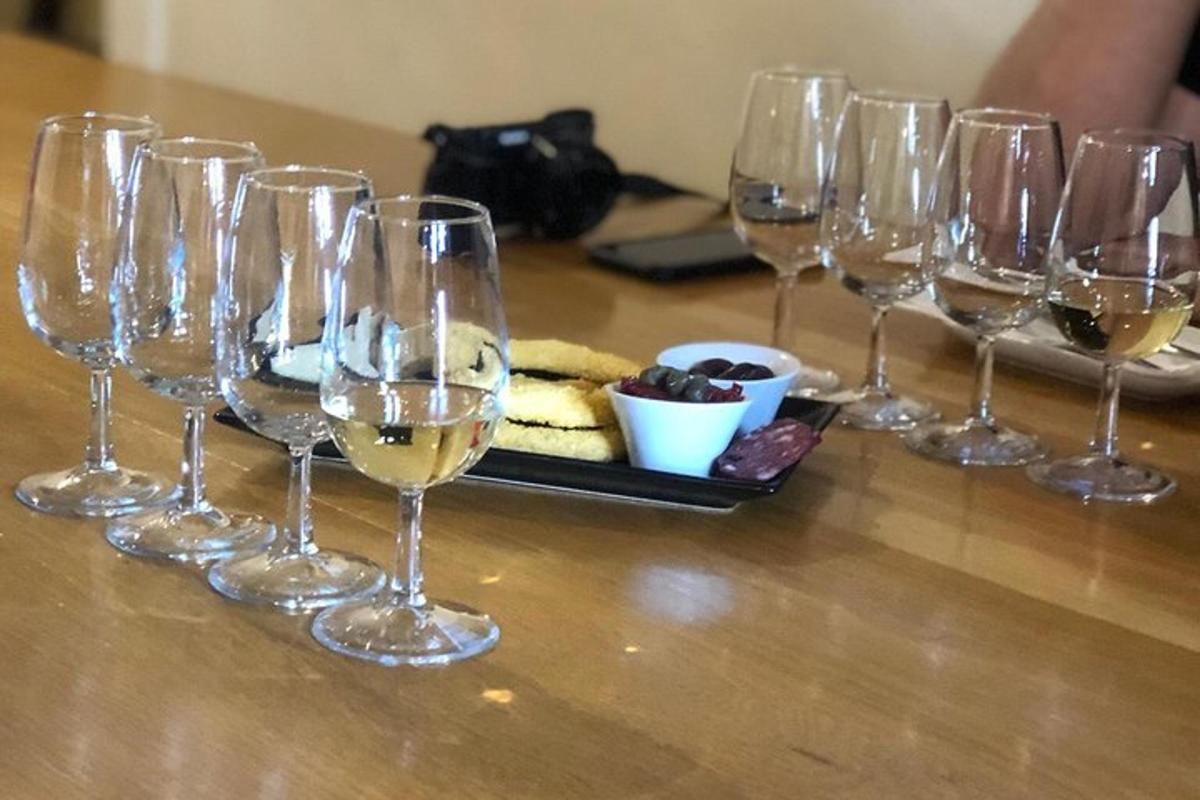 a group of wine glasses sitting on a table