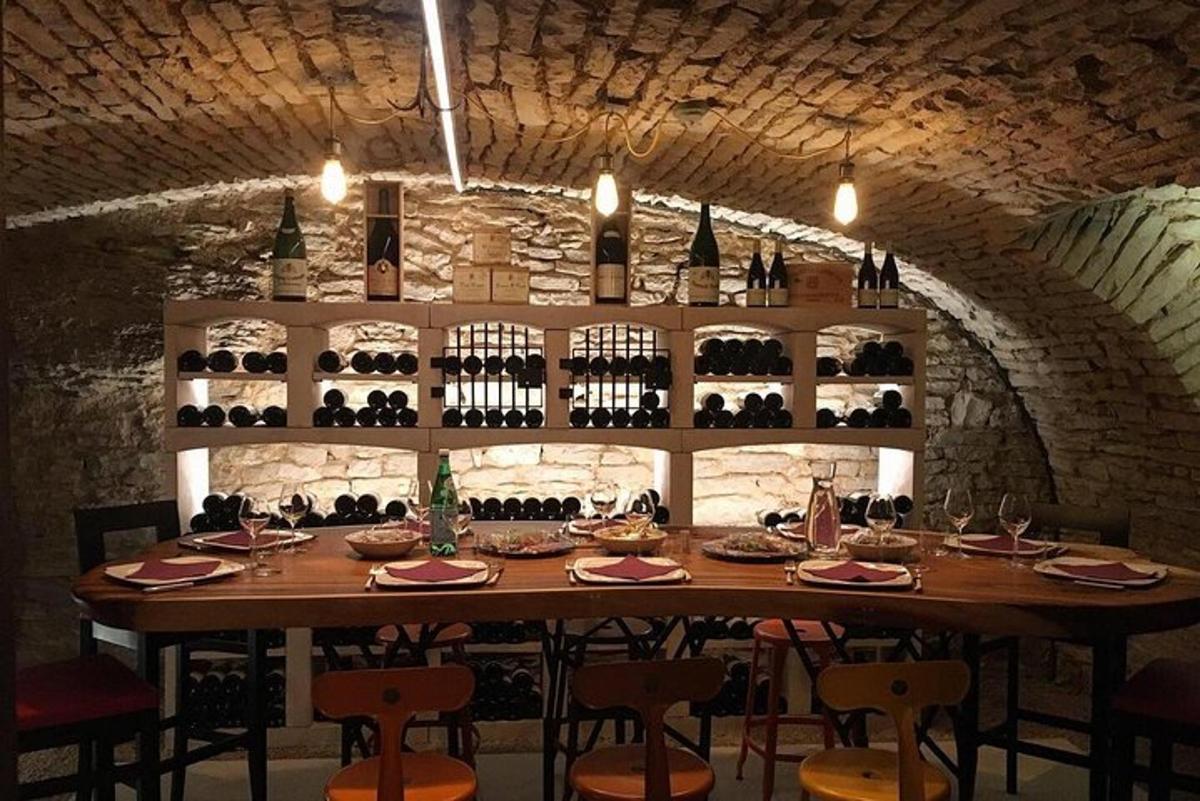 a table in a room with bottles of wine