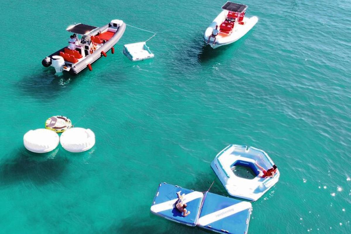 a group of boats floating in the water