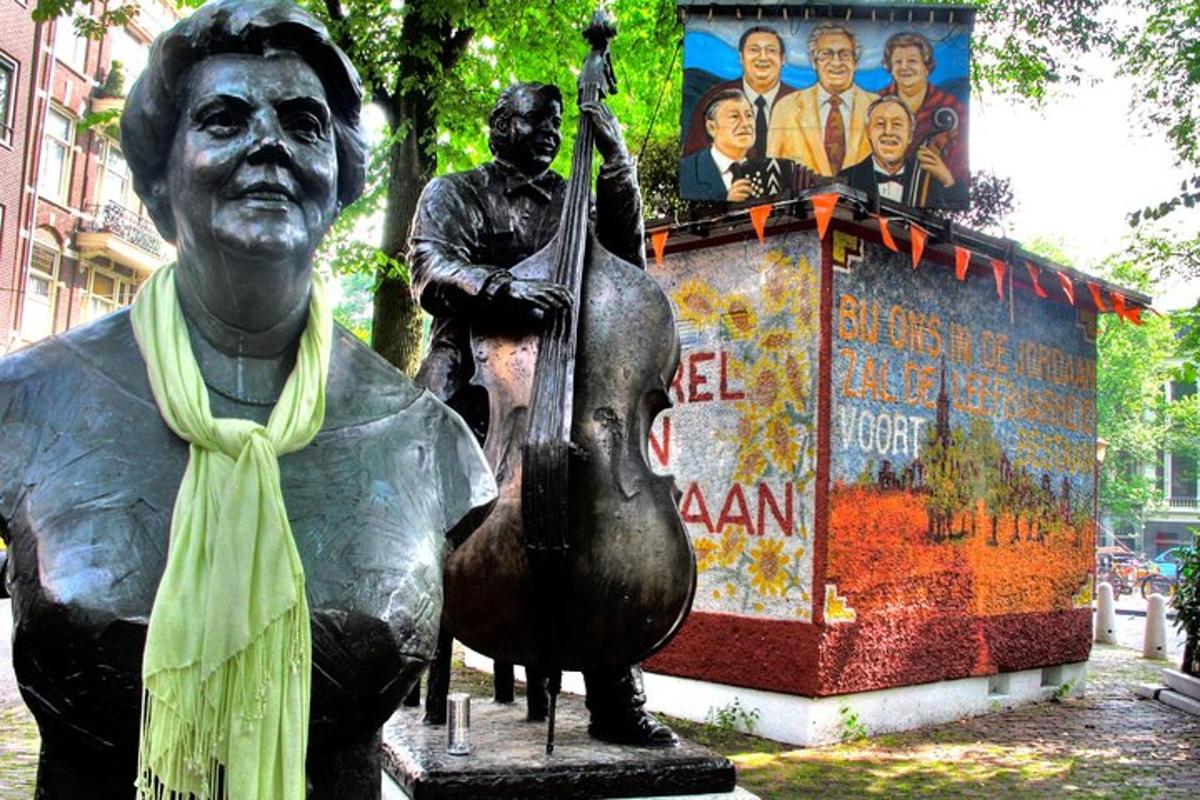 a statue of a man holding a guitar in front of a sign