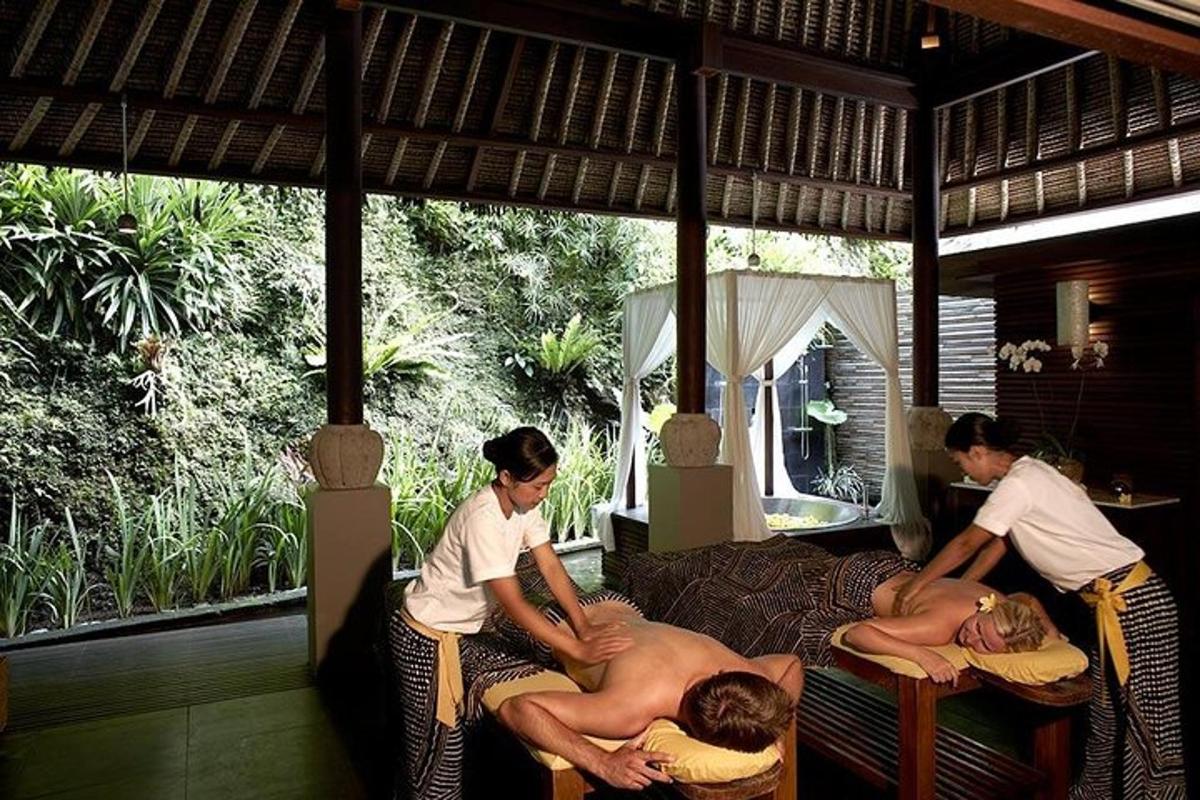 a group of people getting a massage in a bed